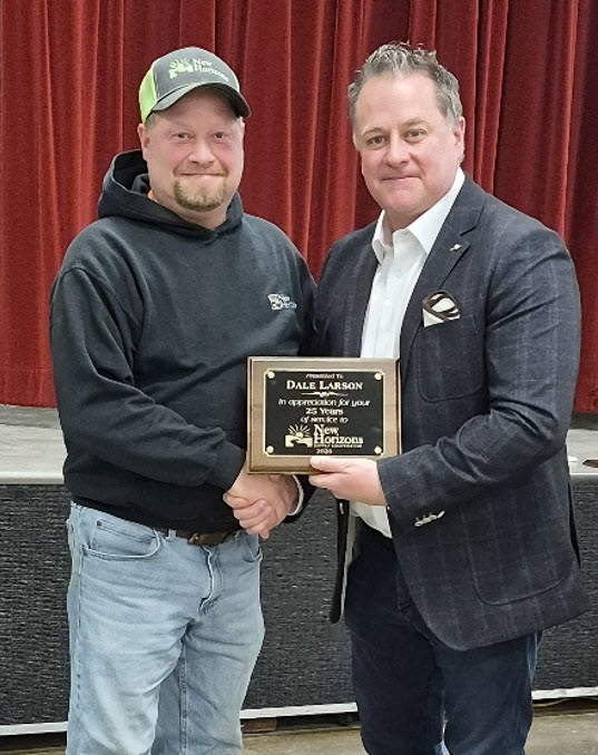 Dale Larson  with CEO Jason Cullen and receiving a plaque for 25 Years of Service