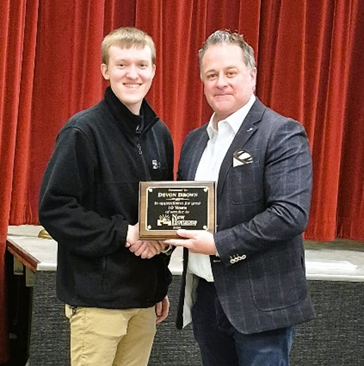 Devon Brown  with CEO Jason Cullen and receiving a plaque for 25 Years of Service